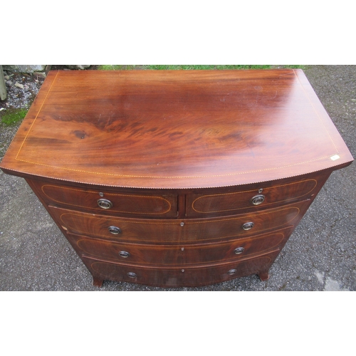 59 - An Edwardian mahogany bow front chest, of two short over three long drawers, with chequer band line ... 