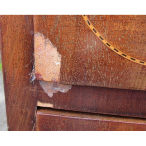 59 - An Edwardian mahogany bow front chest, of two short over three long drawers, with chequer band line ... 