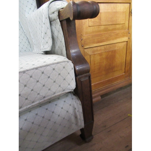 20 - A 19th century style wing back armchair