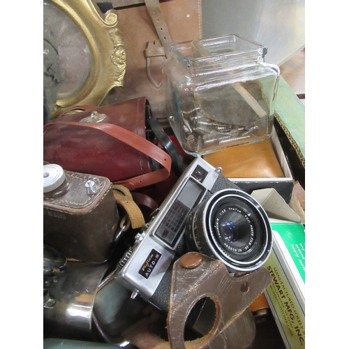 423 - A collection of 19th century and later binoculars, cameras, Fujica-Auto M ,clocks etc