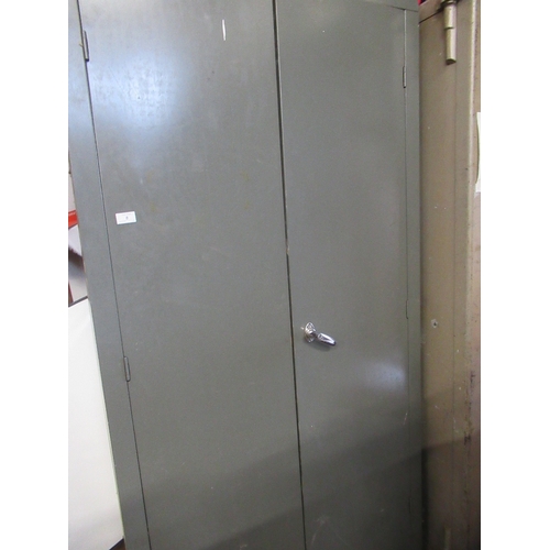 8 - A metal cupboard  72ins x 36ins depth 18ins