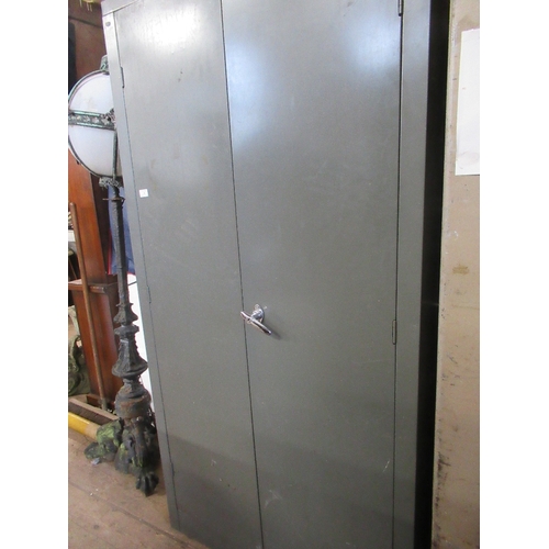 8 - A metal cupboard  72ins x 36ins depth 18ins