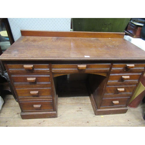 17 - An oak desk  49ins x 22ins x 22 ins