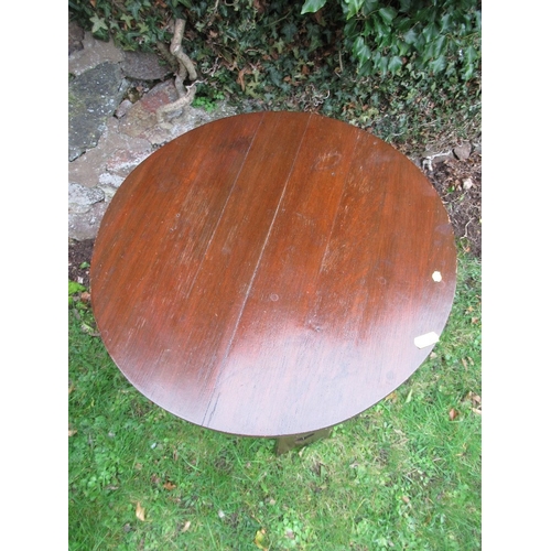 1 - An Arts and Crafts style circular occasional table, diameter 17ins, height 27ins