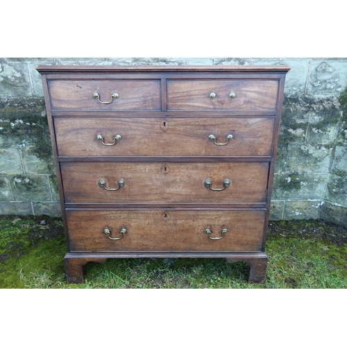 10 - A Georgian mahogany chest, of two short drawers over three graduated long drawers, raised on bracket... 