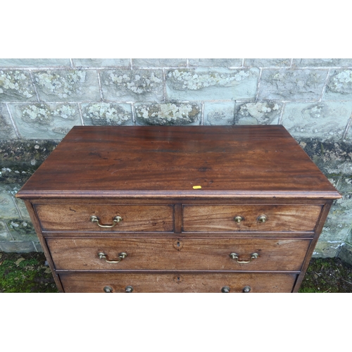 10 - A Georgian mahogany chest, of two short drawers over three graduated long drawers, raised on bracket... 