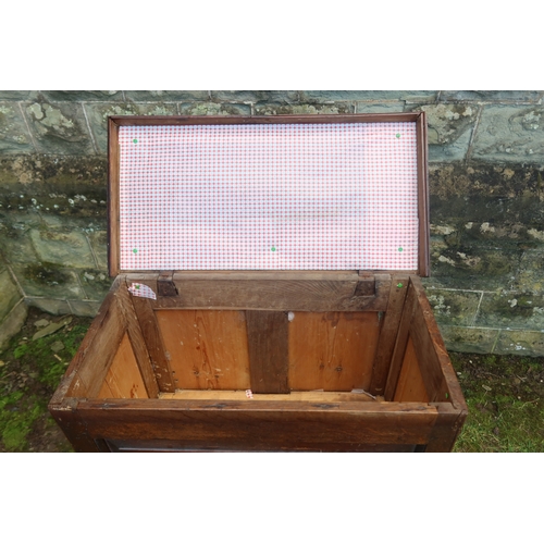 16 - An unusual slim oak mule chest, with panel front and plain raising lid, draw below, width 30ins