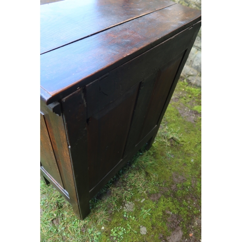 16 - An unusual slim oak mule chest, with panel front and plain raising lid, draw below, width 30ins