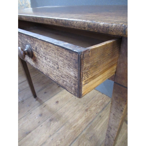 18 - An early 19th century mahogany rectangular side table, fitted with a frieze drawer, width 35ins