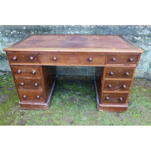 19 - A 19th century mahogany pedestal desk, fitted with three drawers over two pedestals of three drawers... 