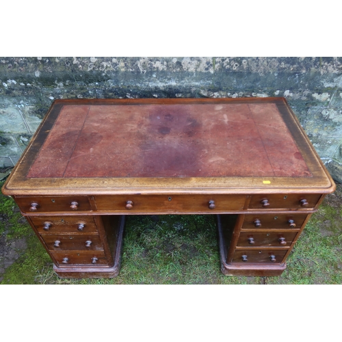 19 - A 19th century mahogany pedestal desk, fitted with three drawers over two pedestals of three drawers... 