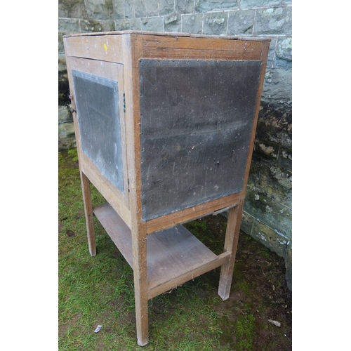 27 - A pine meat safe, with mesh grill raised on a stand, width 28ins