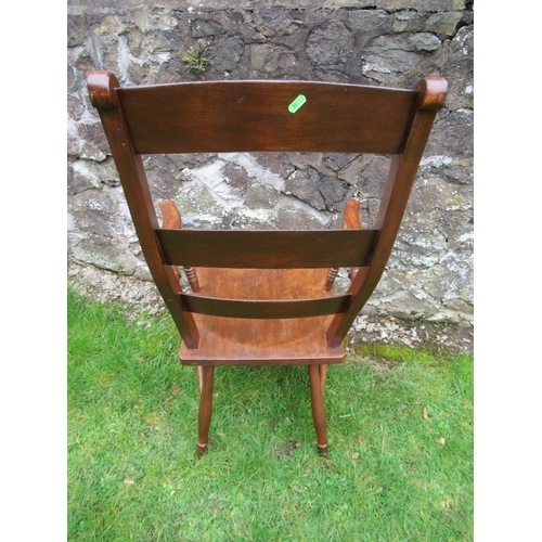 33 - A 19th century ladder back Windsor arm chair