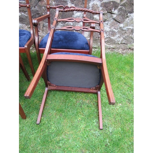 35 - A set of ten rope back dining chairs, with brass stud line inlay and rosette pierced ladder back