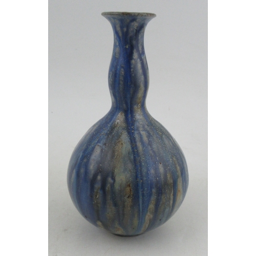 414 - A blue and white art pottery studio club shaped vase, height 7.25ins