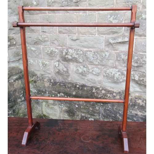 42 - A 19th century mahogany drop leaf table, together with a D end table and a towel rail