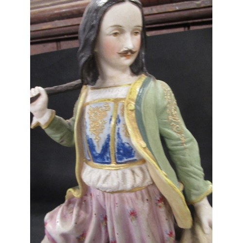 423 - A 19th century continental coloured bisque porcelain figure in the stye of  Vion & Baurry