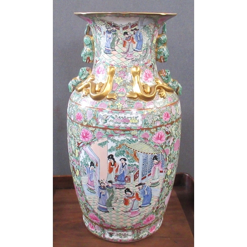 428 - A Chinese famille rose vase, decorated with warriors, court scene, with typical fashion and gilt sna... 