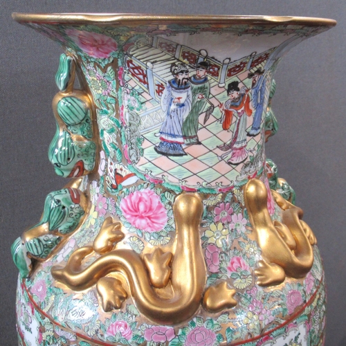 428 - A Chinese famille rose vase, decorated with warriors, court scene, with typical fashion and gilt sna... 