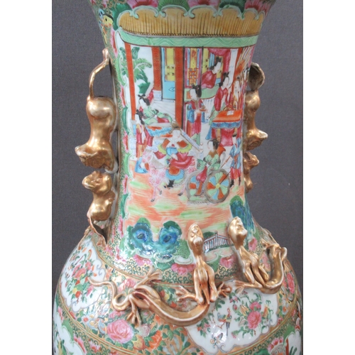 429 - A 19th century Chinese famille rose floor standing vase, with stand, having flared petal rim and dog... 