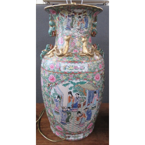 431 - A pair of 20th century Chinese famille rose vases, converted to lamps, decorated with warriors and f... 