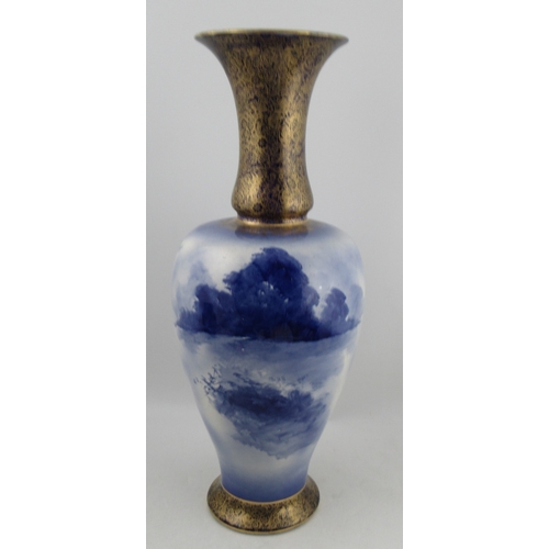 434 - A large Royal Doulton vase, of baluster form, decorated in blue with a woman and child, height 26ins