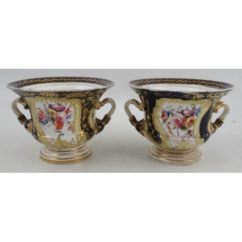 435 - A pair of 19th century porcelain Warwick vases, in the Derby style, painted with reserves of flowers... 