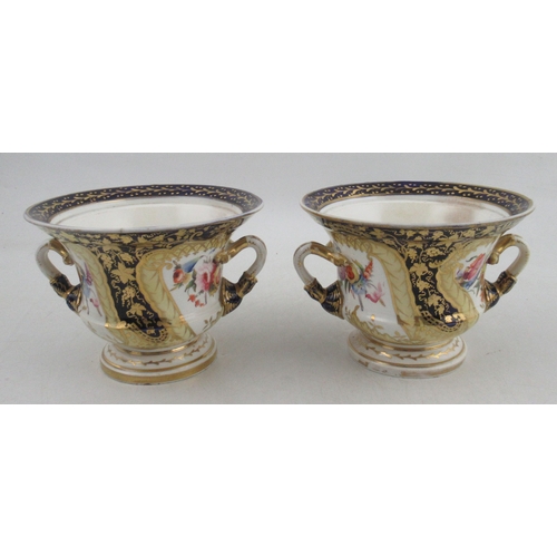 435 - A pair of 19th century porcelain Warwick vases, in the Derby style, painted with reserves of flowers... 