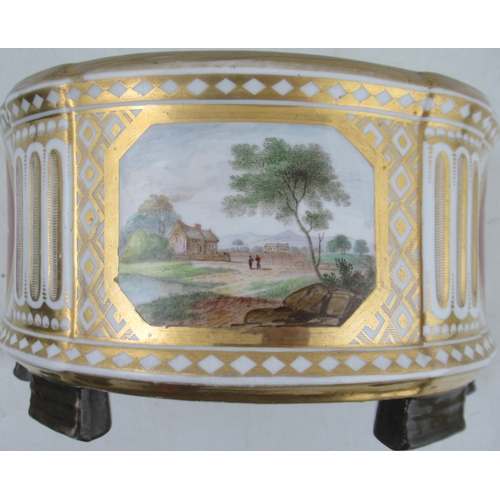 437 - An 18th century porcelain Derby bough pot, painted with a landscape to the centre and winged cherubs... 