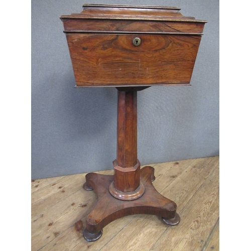 48 - A Regency mahogany teapoy on stand,  fitted with two pairs of canisters , height 32 ins, width 16ins