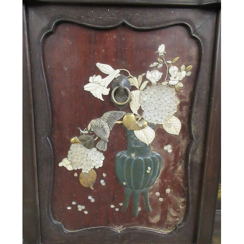 5 - A Japanese shibayama cabinet, fitted with shelves, cupboards and drawers, decorated with flowers, in... 