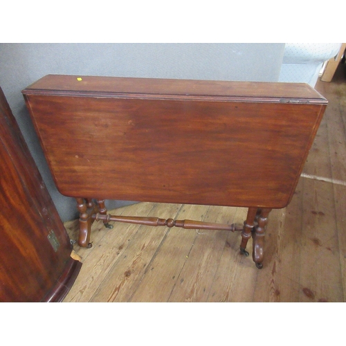 50 - A Georgian mahogany corner cupboard, together with a 19th century mahogany Sutherland table