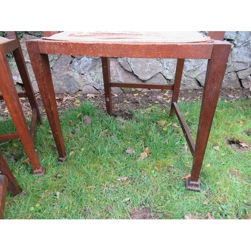 6 - A set of six oak dining chairs, with pewter and ebonized inlay, in the style of George Montague Ellw... 