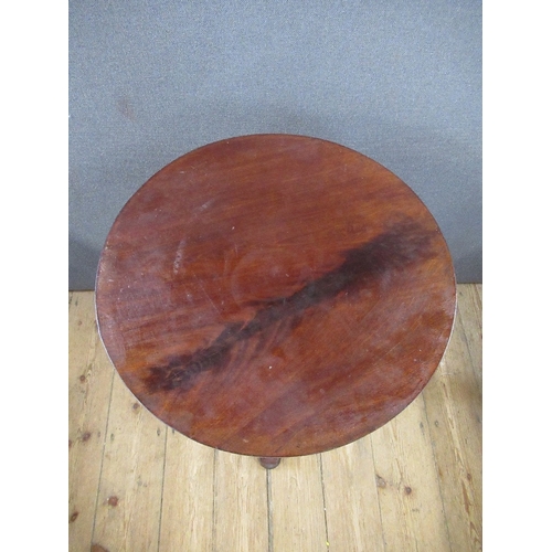 65 - A 19th century mahogany occasional table, raised on turned column , terminating in triform base, dia... 