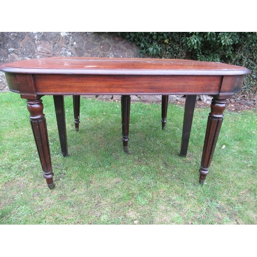 67 - A 19th century mahogany extending dining table, with concertina action and extra leaf raised on reed... 