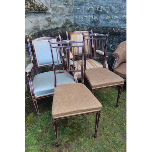 9 - An Edwardian mahogany salon suite, with bone inlay, comprising two seat sofa, two arm chairs, two el... 