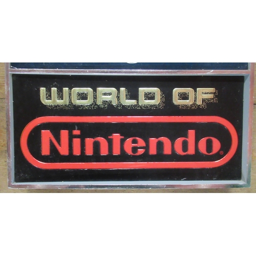 113 - A world of Nintendo Mario wall clock, of rectangular form, 19.5ins x 12ins