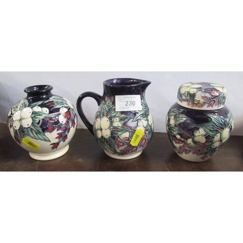 230 - A Moorcroft vase, jug and ginger jar, all decorated in the 'Snowberry pattern' heights 5ins