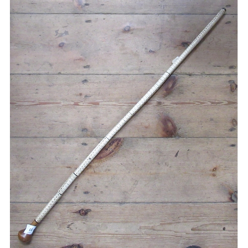 231 - A vertebrae walking cane, length 31ins