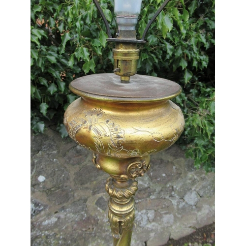 41 - An ornate 19th century gilt metal standard lamp, with scroll decoration,  with marble plinth, over t... 