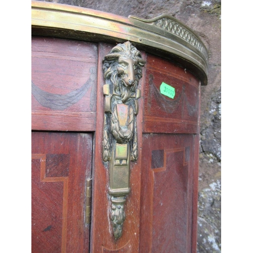 43 - A 19th century Dutch marquetry commode, with marble top, with applied gilt mounts of ram heads and a... 