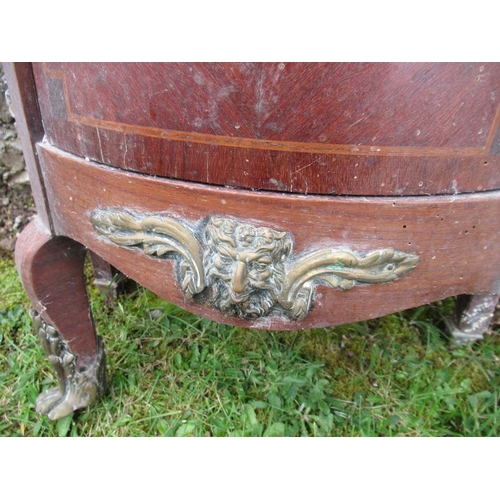 43 - A 19th century Dutch marquetry commode, with marble top, with applied gilt mounts of ram heads and a... 