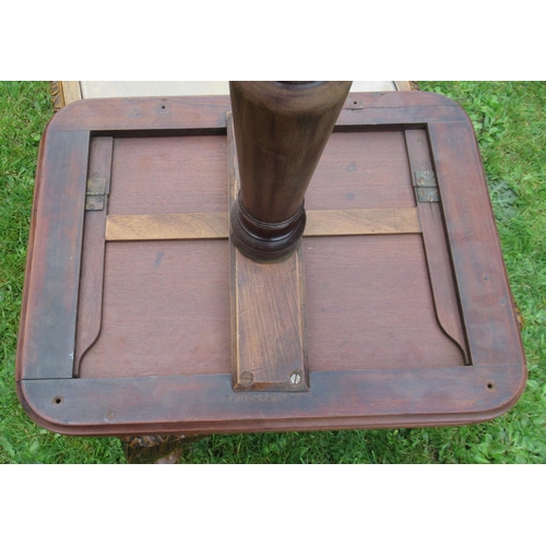 54 - A 19th century mahogany rectangular top occasional table, on turned column, with carved outswept sup... 