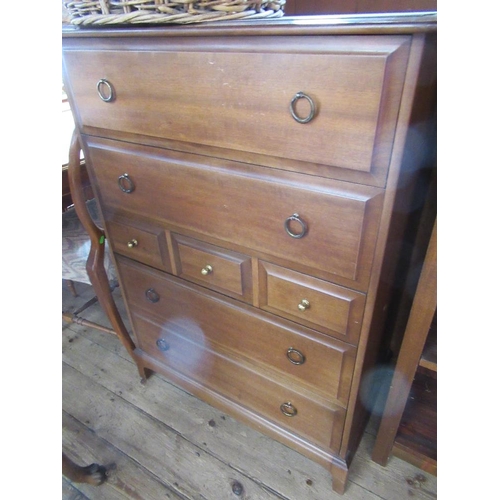 62 - A mahogany glazed cabinet, width 41ins, height 45ins together with a Stag chest of drawers, width 22... 