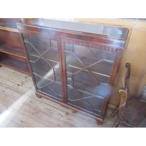 62 - A mahogany glazed cabinet, width 41ins, height 45ins together with a Stag chest of drawers, width 22... 