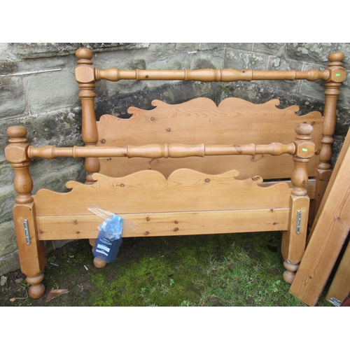 70 - A wood and leather double sleigh bed, together with a pine double bed