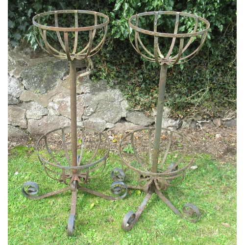 72 - A pair of double metal flower stands, height 38ins