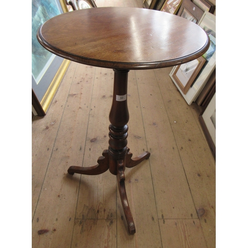 53 - A mahogany circular topped tripod table, raised on a turned column and three outwept supports, diame... 