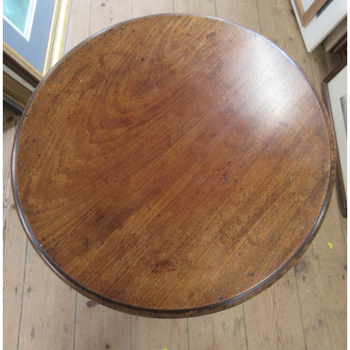 53 - A mahogany circular topped tripod table, raised on a turned column and three outwept supports, diame... 