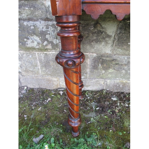 10 - A 19th century mahogany serving table, raised on turned legs, width 48ins